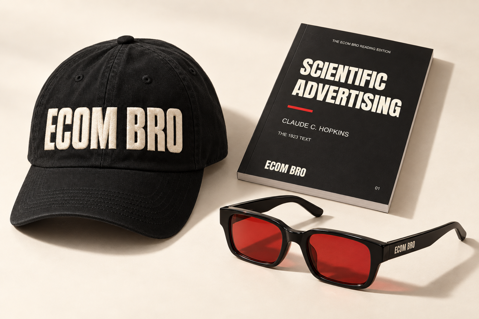 ECOM BRO kit design: black embroidered cap, Scientific Advertising reading edition and black frames with red lenses